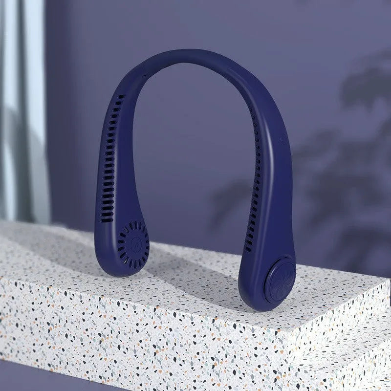 A pink portable bladeless neck fan with a soft neckband, shown being worn.