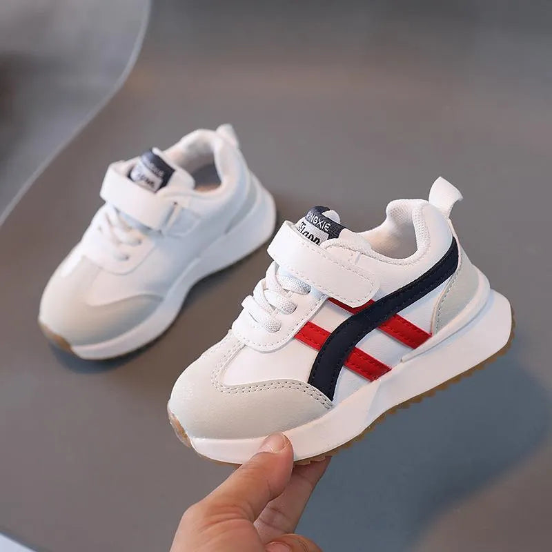 Children's white synthetic leather sneakers with Velcro closure and non-slip rubber soles