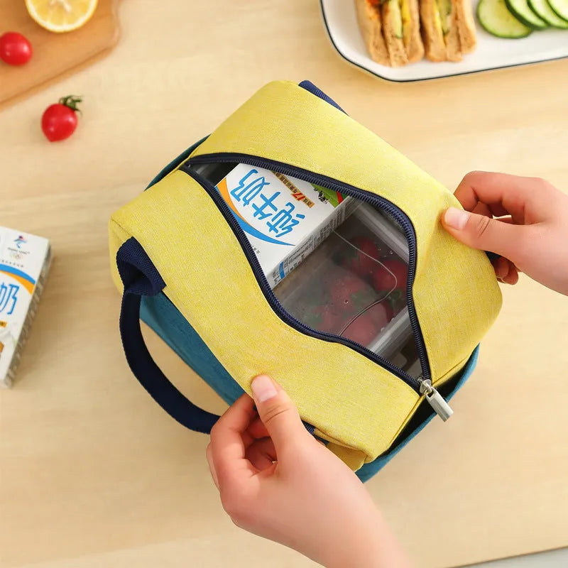 Insulated aluminium foil and Oxford cloth lunch bag in blue, shown closed.