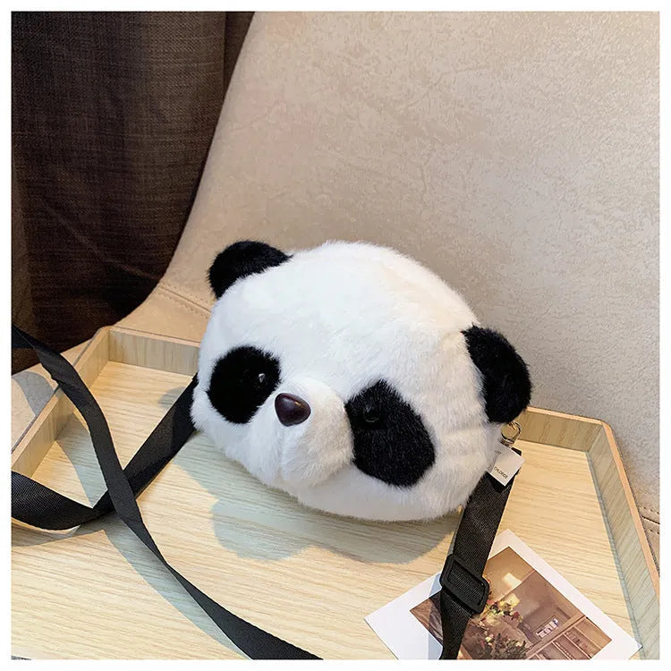 Soft plush panda head design cylindrical crossbody messenger bag with a sandwich pocket.