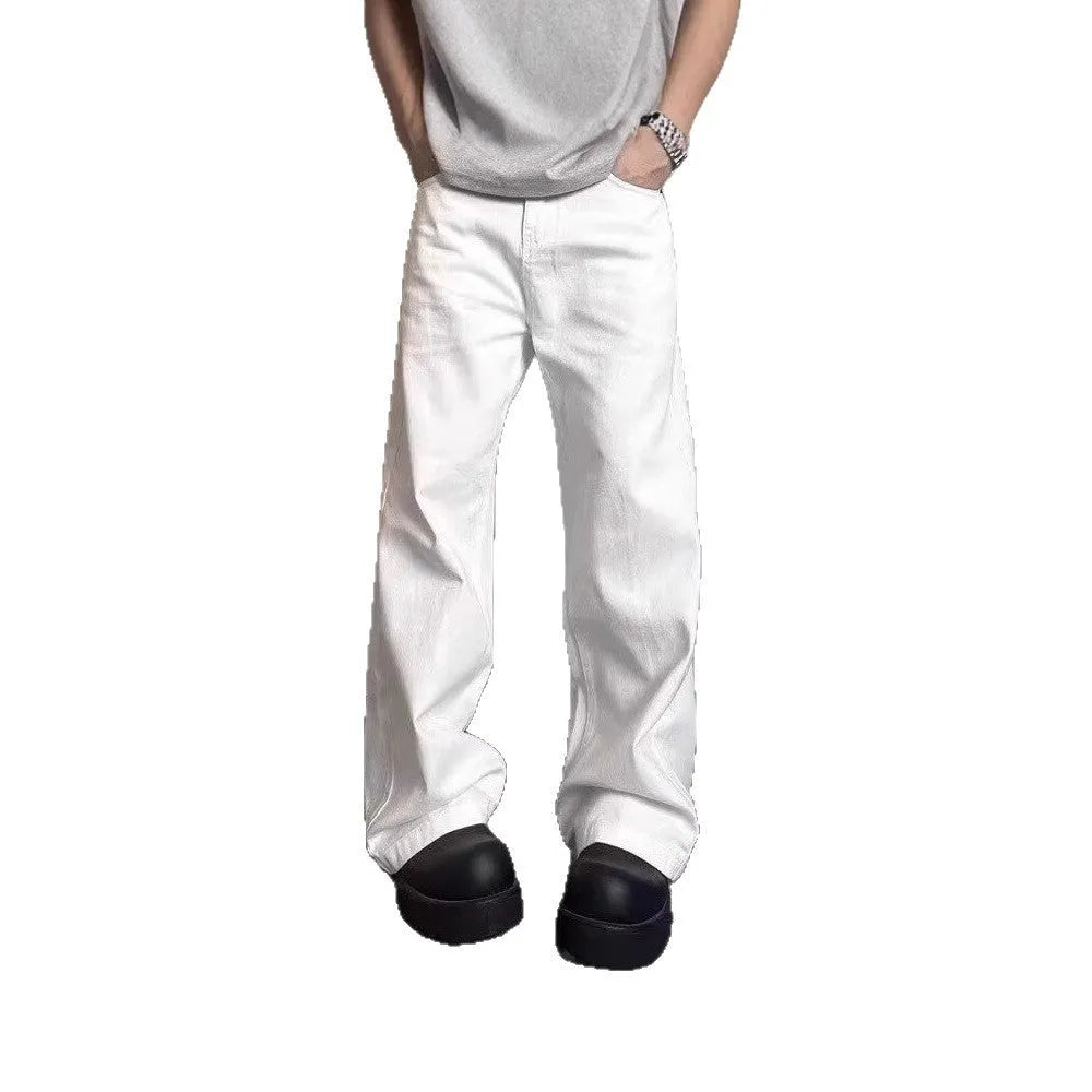 Men's white straight-leg cotton denim jeans on a hanger, showing the mid waist and wide leg opening.
