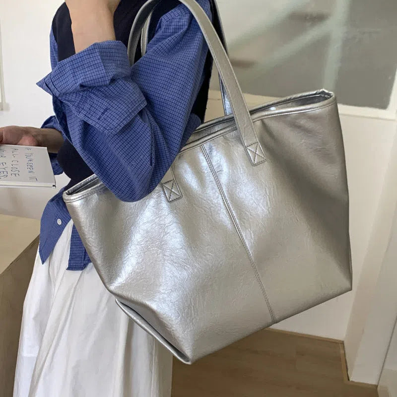 Fashionable large-capacity vintage tote bag in soft PU with stitched seams, horizontal shape, double straps