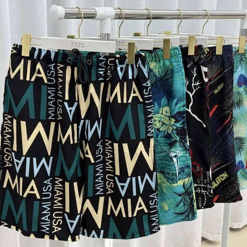 Man's loose-fitting striped beach pants made from quick-drying polyester fabric.