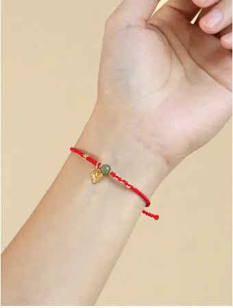 Handmade 925 silver and Hetian jade bracelet with adjustable woven strap