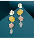 A pair of simple disc-shaped alloy earrings with a Morandi colour oil-drip finish on a sterling silver post.