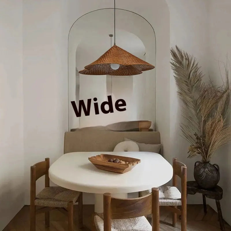 Silent Style rattan woven ceiling lamp in natural colour, shown in a zen-inspired room setting.
