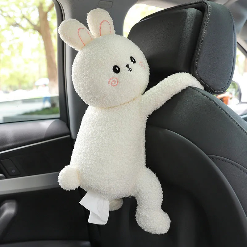 Plush fabric car seat back tissue box holder with animal character design mounted behind car headrest
