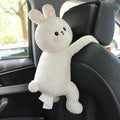 Plush fabric car seat back tissue box holder with animal character design mounted behind car headrest