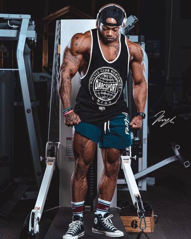 Men's casual running shorts in black, navy blue, wine red, and army green, featuring breathable wicking fabric.