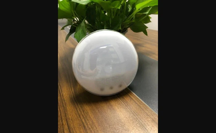 WiFi Voice Control Intelligent Alarm Clock with Sunrise Wake-up Light on bedside table