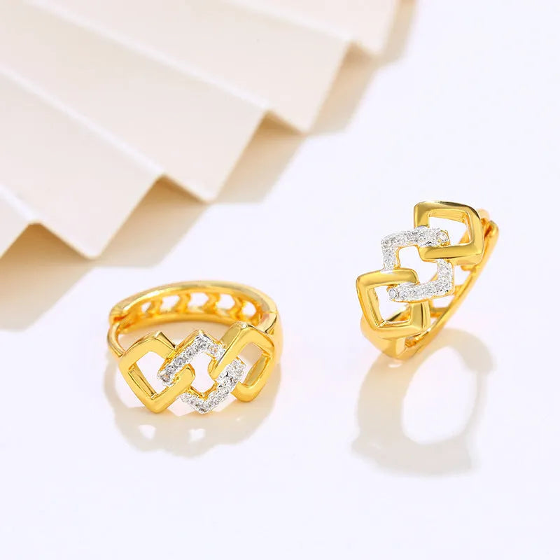Gold geometric hollow-out earrings with colour separation detail and simple electroplated design