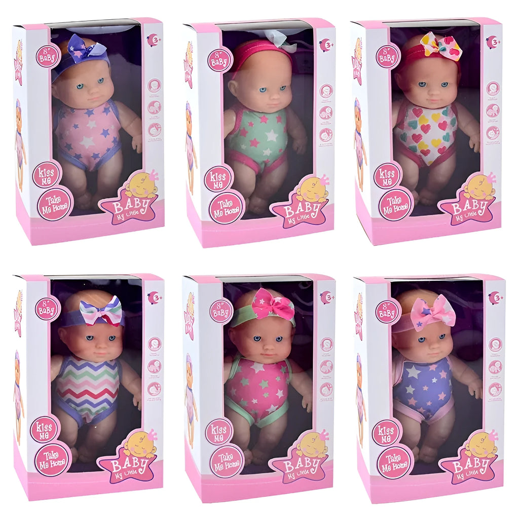 A detailed vinyl simulation baby figurine doll, showing its realistic features and proportions.