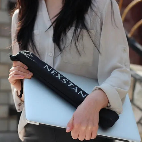 Black foldable portable laptop stand with enhanced nylon construction shown with travel case