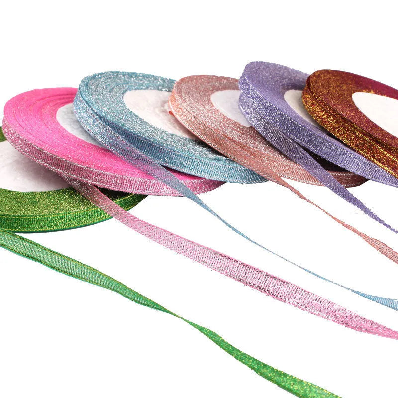 A roll of narrow 0.6cm wide polyester ribbon in a chosen colour from a palette of 23 options.