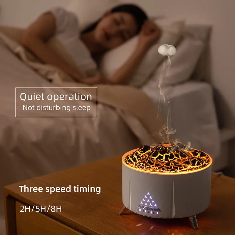 White portable simulated flame ultrasonic aromatherapy air humidifier with remote control on a table