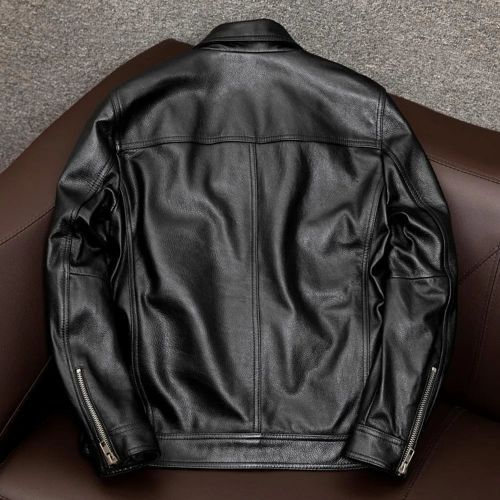 Men's plus size black retro lapel short leather jacket with side pockets on a model.