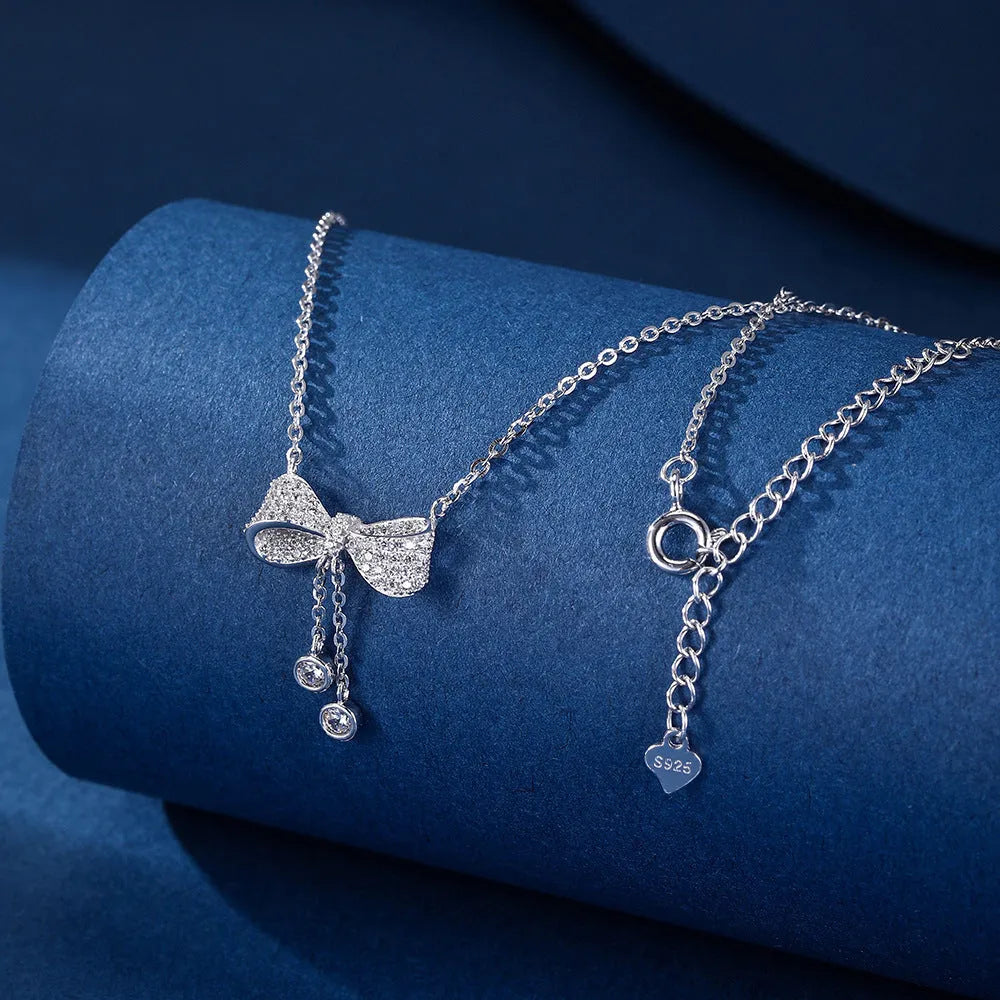 S925 sterling silver bow pendant necklace with O-ring chain, silver colour, 40-45cm adjustable length