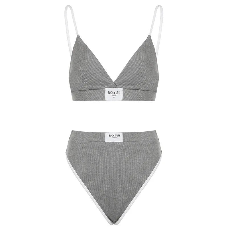 Women's embroidery contrast binding bikini set in black, gray, or white with sleeveless design and shorts