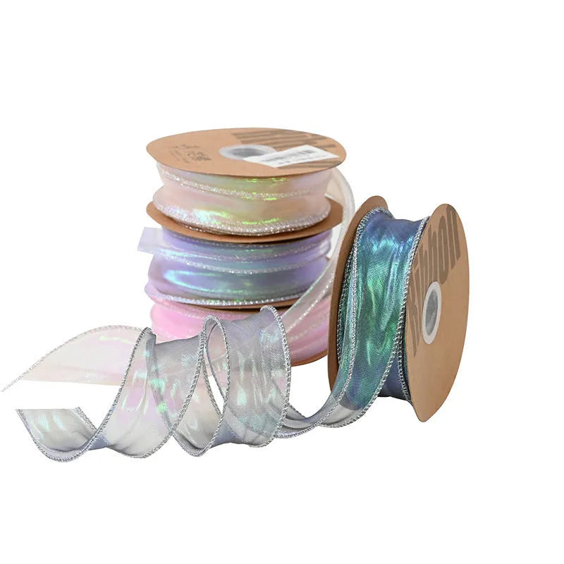 Roll of fishtail yarn floral design mesh craft ribbon in various colours, showing 4cm width.
