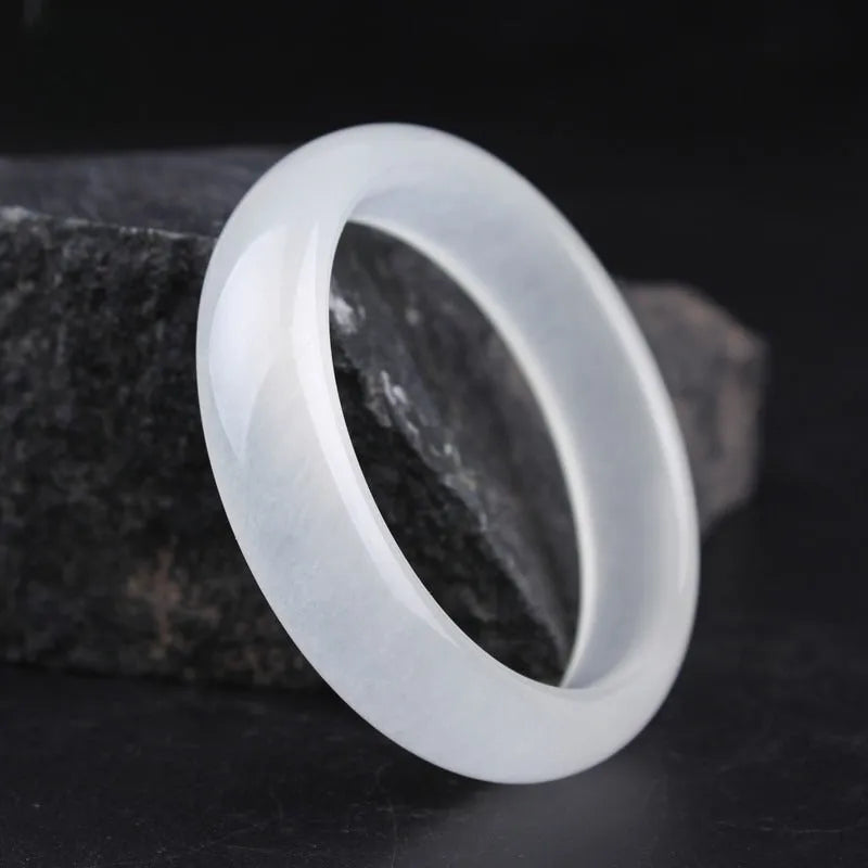 Minimalist jade bracelet in Ice-like White Moonlight colour showing both flat rod and round rod profile options