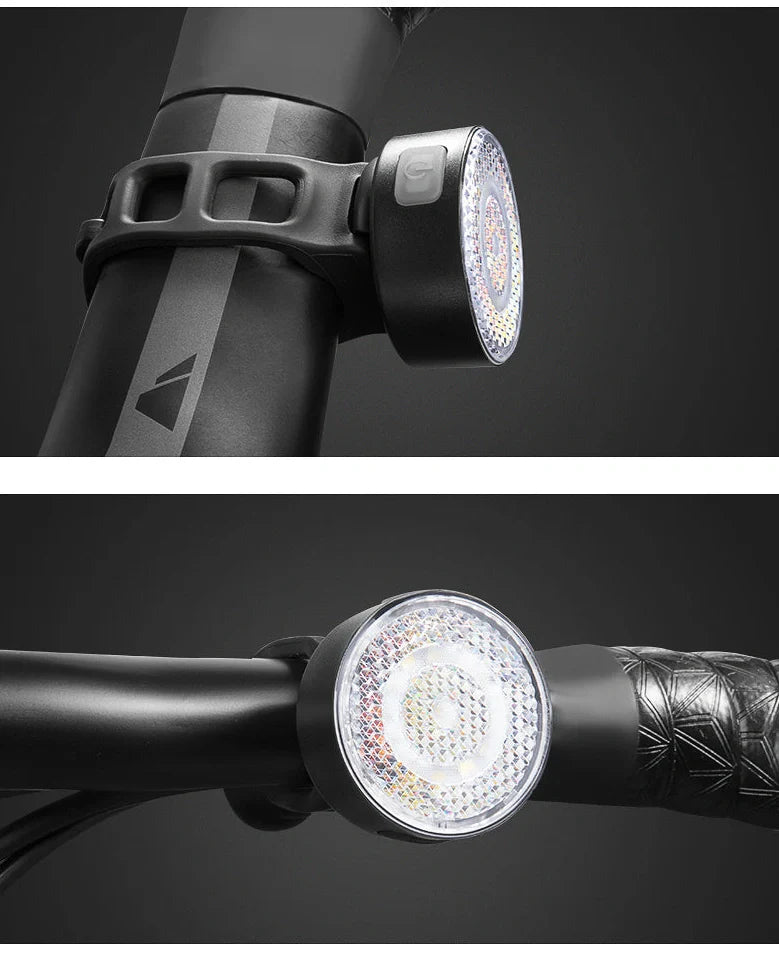 Bicycle LED headlight with clip attachment showing lens reflectors and USB port for charging
