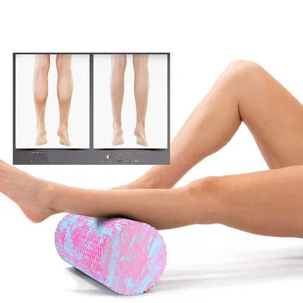 Solid EVA foam yoga roller in pink and blue, 30cm and 45cm lengths, on a yoga mat