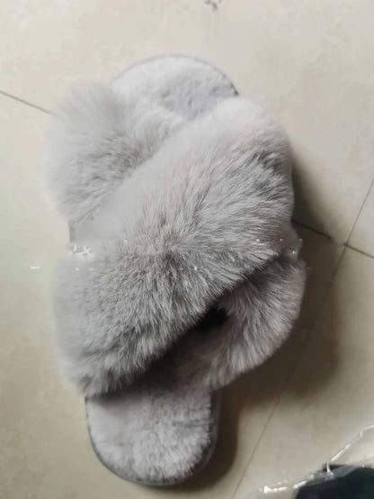 Cozy faux fur cross slippers for women in various colors, featuring a stylish design and plush, comfortable material