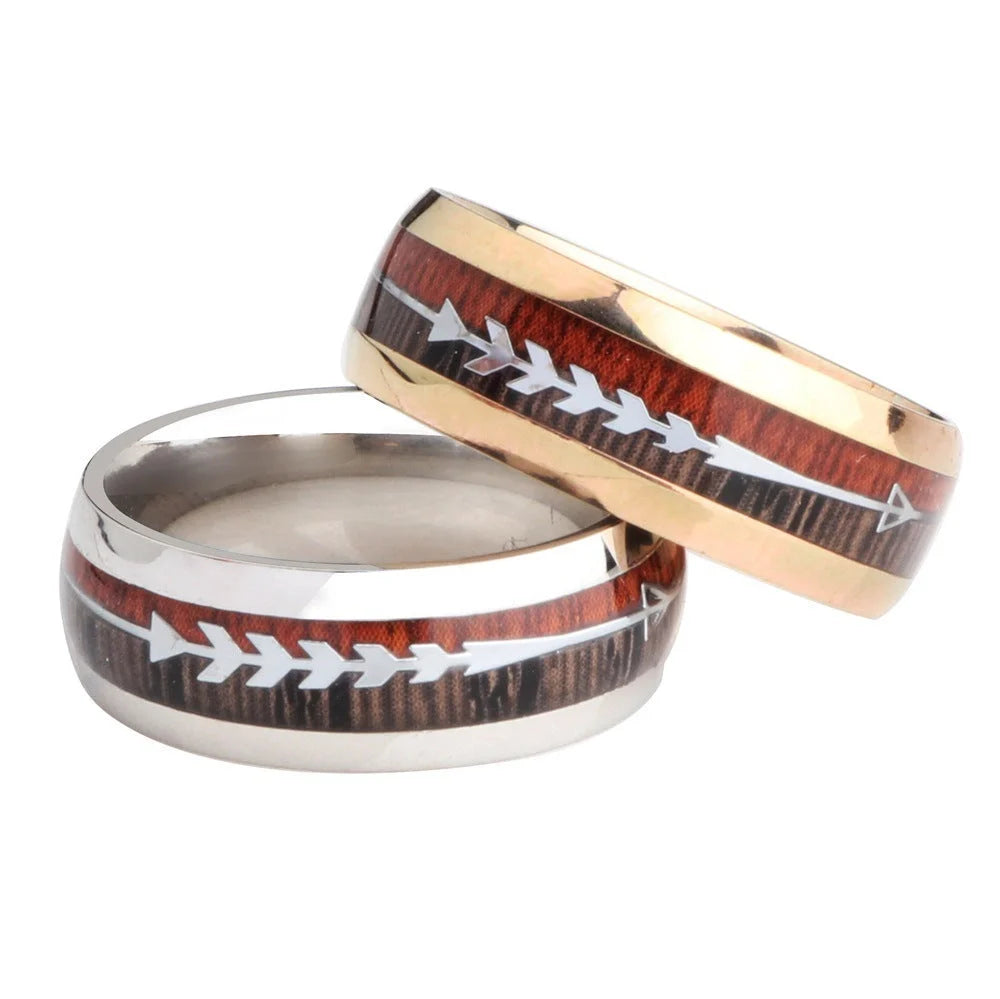 Men's stainless steel ring with wood grain arrow inlay in black, rose gold, and silver
