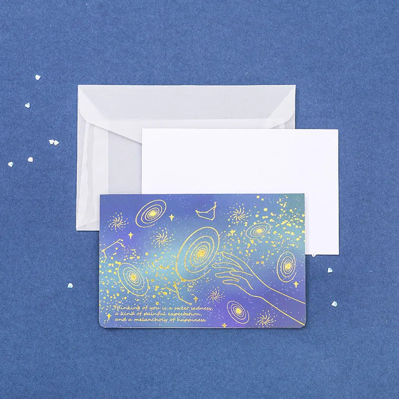 Set of three bronzed, pre-folded paper greeting card envelopes in one of four colour styles.