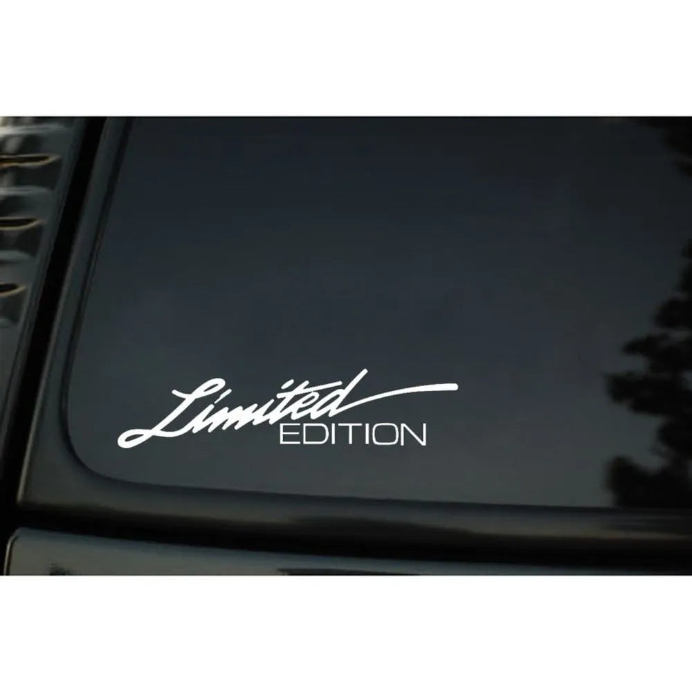 Plastic reflective car bumper sticker measuring 16cm long, shown in black, white, and colourful options.