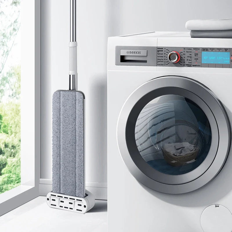 Stainless steel flat mop with microfiber pads for efficient kitchen cleaning