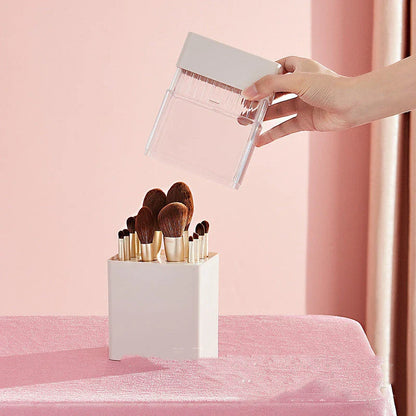 Inverted makeup brush storage bucket in white, blue, and pink for organised dressing tables