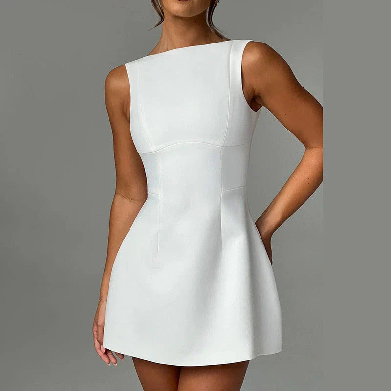 Stylish backless mini dress in various colors, featuring a high-waisted, sleeveless design perfect for warm weather wear.