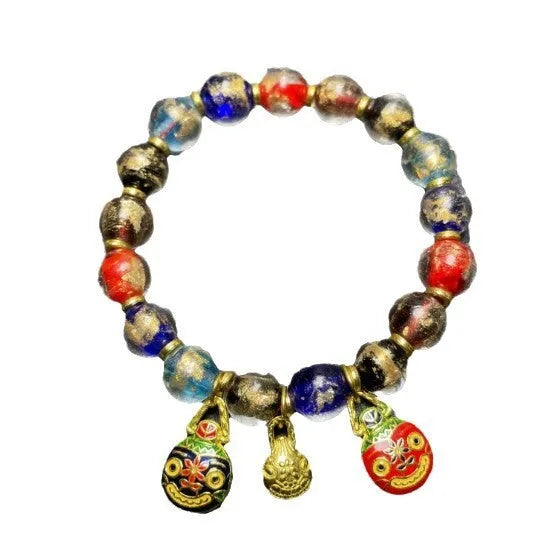 Glass court style bracelet with ancient French glaze finish showing geometric auspicious patterns