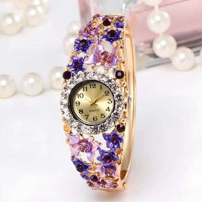 Small round flower diamond ladies bracelet watch, 20mm diameter, 10mm thick, alloy strap in gold colour with mineral glass mirror