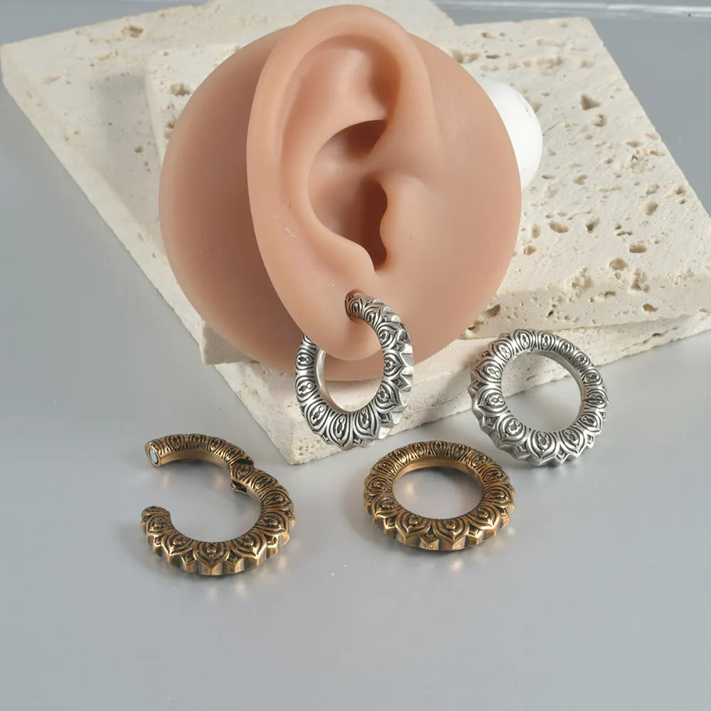 Large retro alloy earrings with hollow-out copper auricle shape and antique silver dragon design.