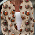 Loose-fit digital printed top with lapel collar on a hanger, showing graphic print design.