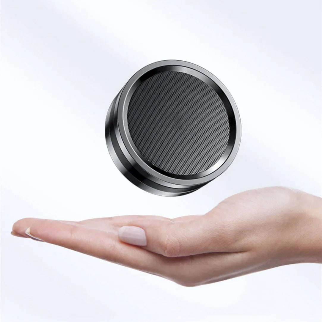 Portable wireless ABS Bluetooth speaker in black, 80x36mm, with USB power and built-in battery
