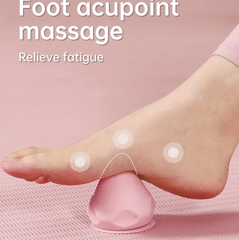 Green silicone massage cone with suction cup, measuring 62mm by 75mm for muscle relief