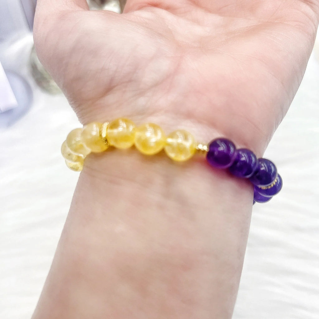Handmade women's crystal bracelet with amethyst stones in yellow and purple colours