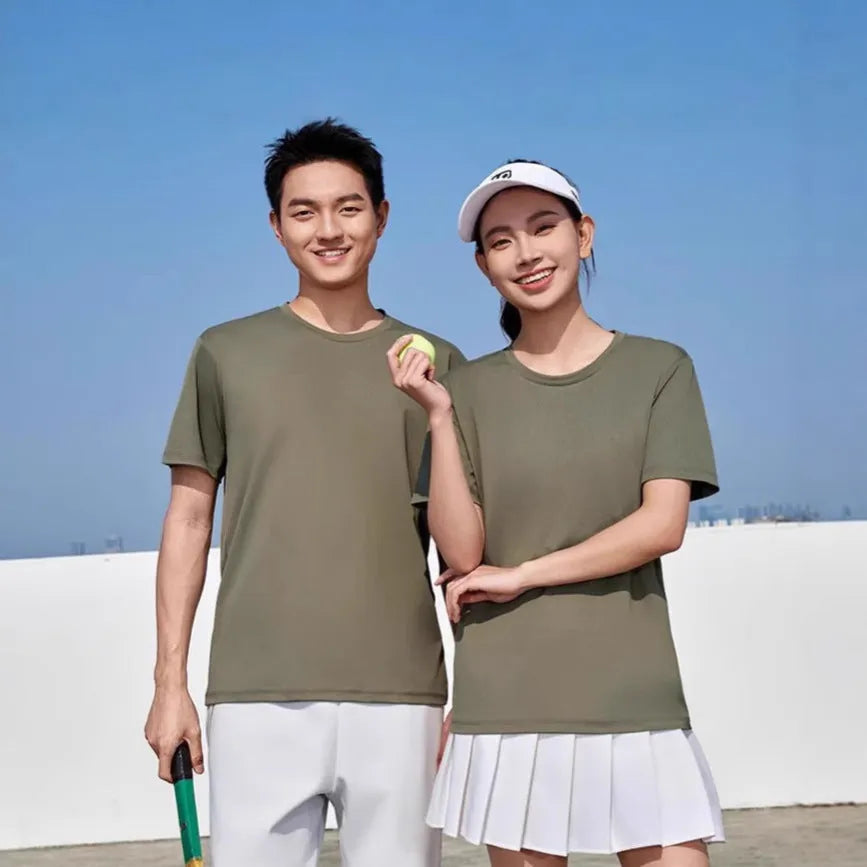 Men's solid colour loose-fit polyester t-shirt with round neck and short sleeves on a hanger.