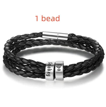 Personalized braided leather bracelet with engraved charm for men, available in black, brown, and navy colors