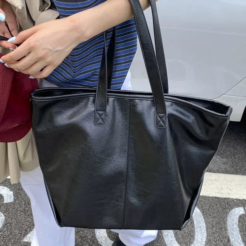 Fashionable large-capacity vintage tote bag in soft PU with stitched seams, horizontal shape, double straps