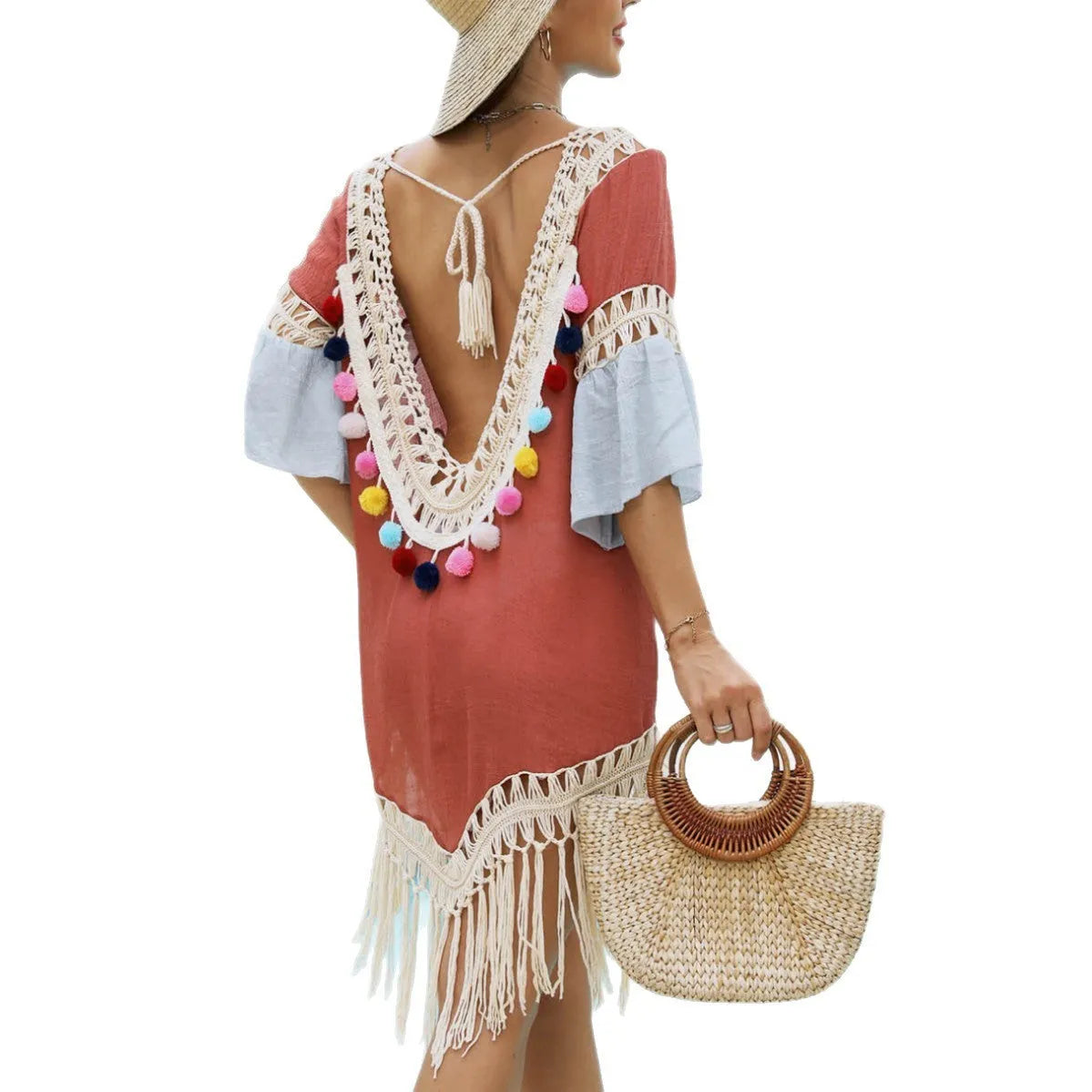 Orange floral beach overskirt with hand-crochet stitching and tassel detailing