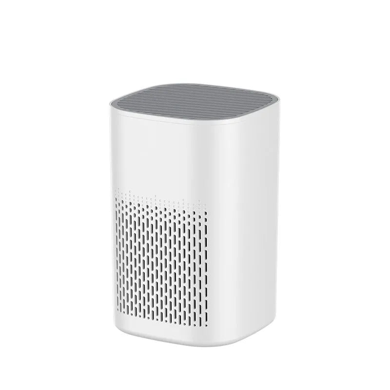 Desktop air purifier machine with USB cable on a work desk