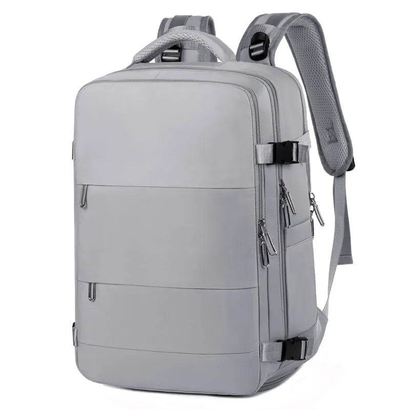 Women's large capacity travel backpack in purple with multiple compartments and air pillow belt