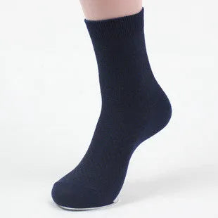 A pair of men's bamboo fibre ankle socks with a small square pattern, shown in one of the five available colours.