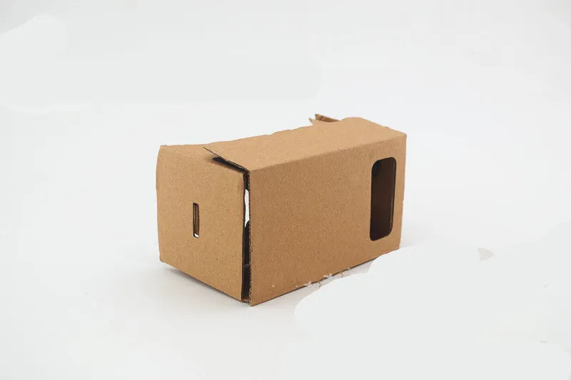 Pink and white foldable VR cardboard glasses headset with 3D lenses for smartphones.