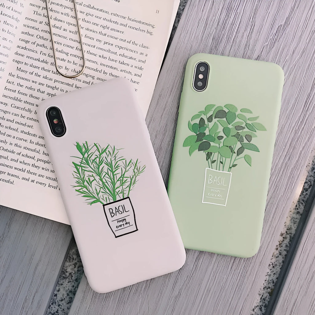 White silicone iPhone case with painted plant pattern design showing 360-degree edge protection