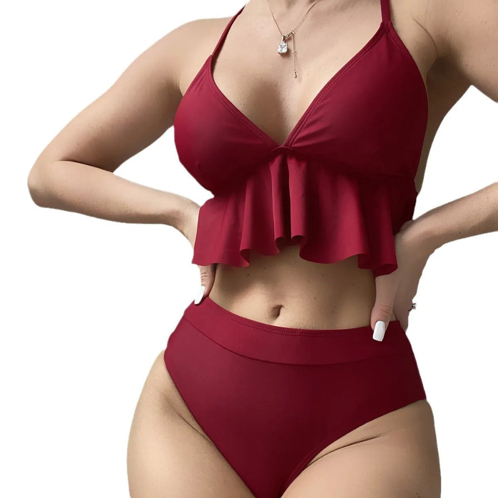 Women's solid colour split bikini swimsuit in polyester spandex fabric on a neutral background.